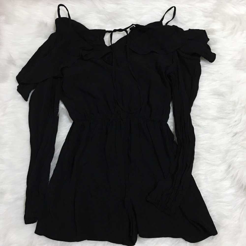 Black cold-shoulder long sleeve ruffle romper